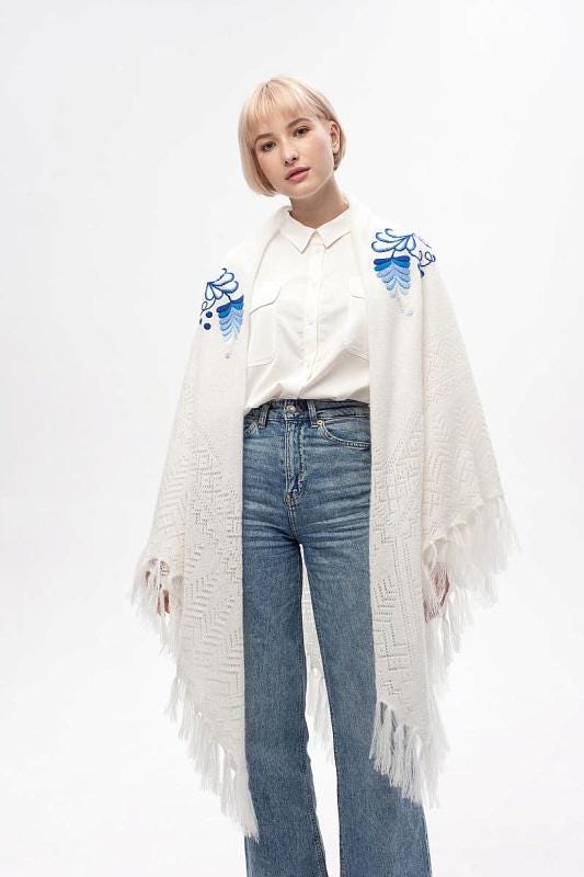 Authentic Orenburg shawl featuring traditional Gzhel - patterned embroidery